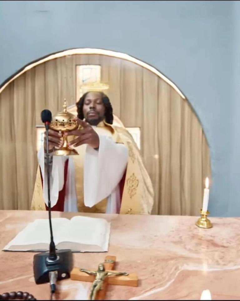 VIDEO Asake mocked Catholic Church while holding an Eucharist in