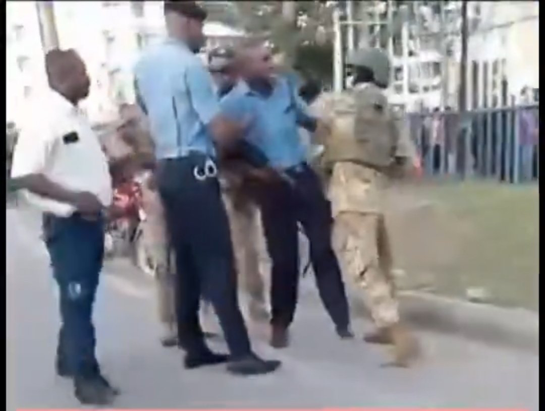 VIDEO KDF Rangers beating and slapping Kenya police in public