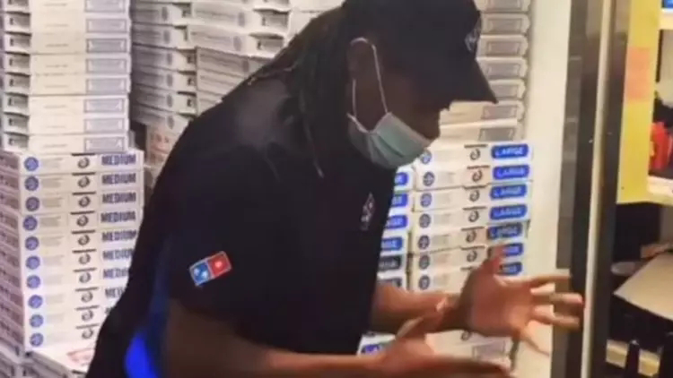 VIDEO NPC Miles Morales Malik Ambersley scattered boxes of pizza