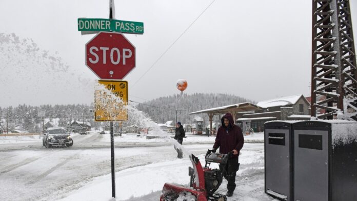Powerful storm in California and Nevada shuts interstate and dumps snow on mountains
